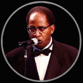 Toni Lorenzo singing at the microphone